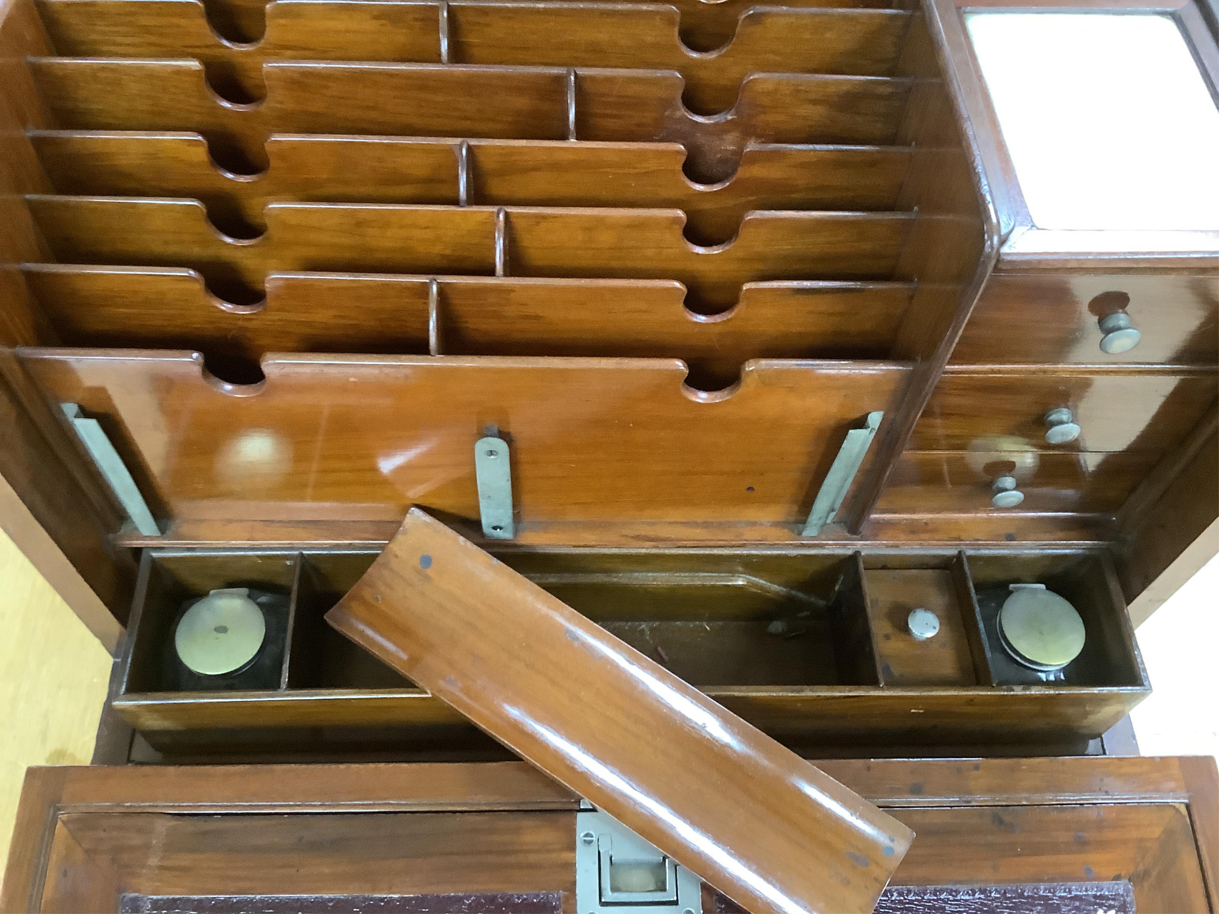 A Victorian burr walnut travelling stationery compendium combined with writing slope, 43cm wide. Condition - fair